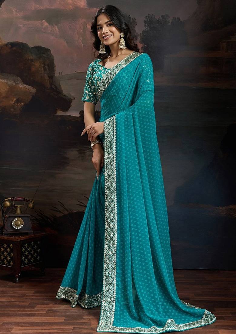Women rangoli blue zari lace work saree