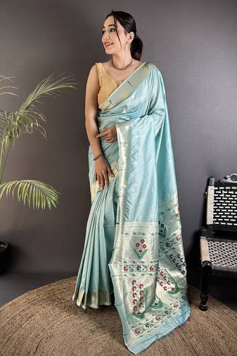 Women sky blue floral ikkat motifs lichi silk saree