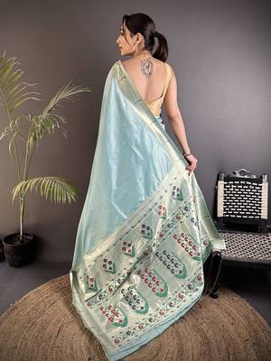 Women sky blue floral ikkat motifs lichi silk blend saree 3