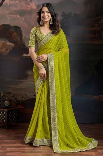 Women rangoli mehendi zari lace work saree