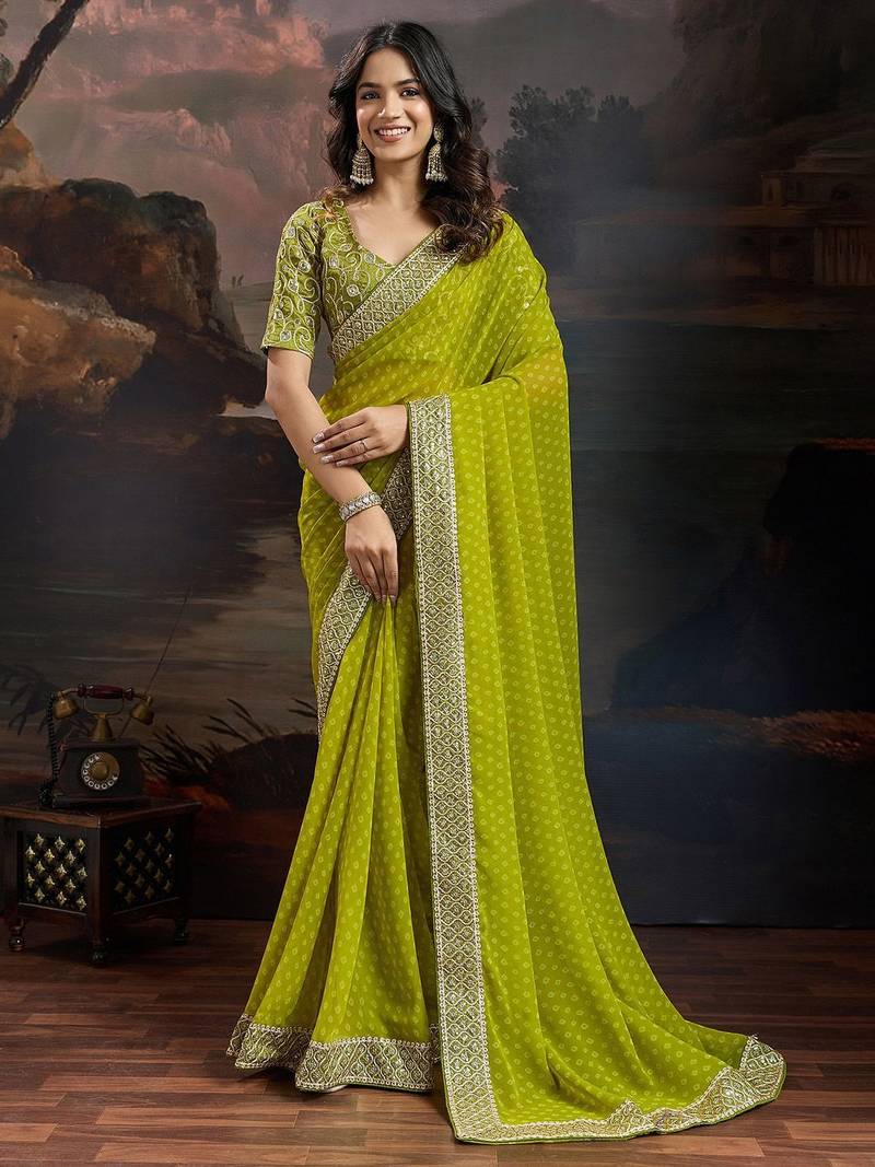 Women rangoli mehendi zari lace work saree