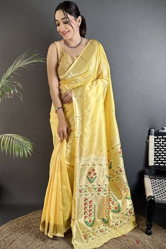 Women light yellow floral ikkat motifs lichi silk saree