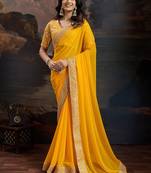 Women rangoli yellow zari lace work saree