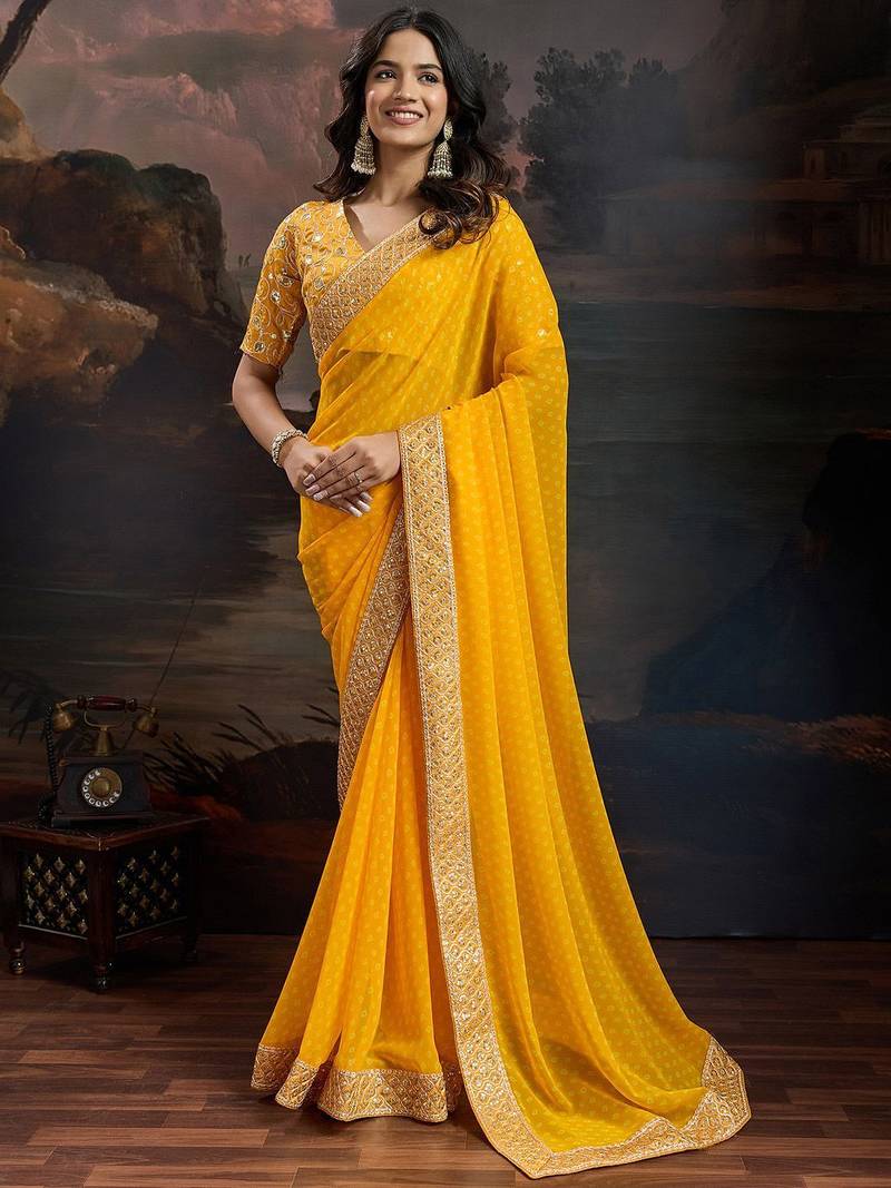 Women rangoli yellow zari lace work saree