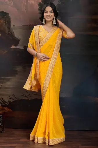 Women rangoli yellow zari lace work saree