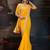 Women rangoli yellow zari lace work saree