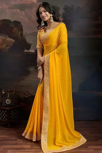 Women rangoli yellow zari lace work saree
