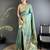 Women light green floral ikkat motifs lichi silk saree