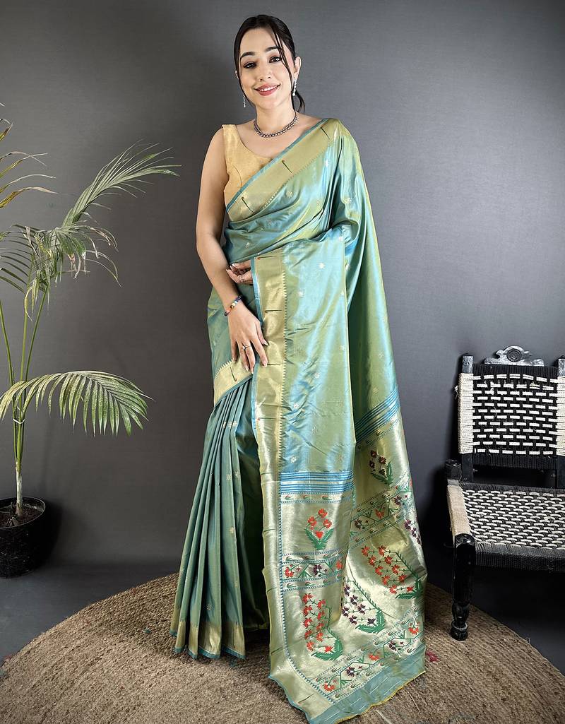 Women light green floral ikkat motifs lichi silk saree