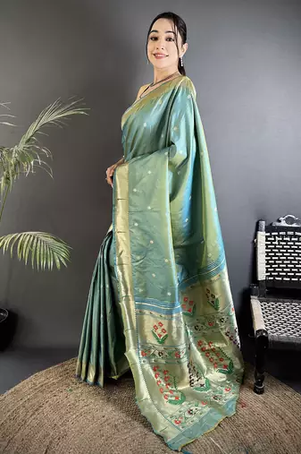 Women light green floral ikkat motifs lichi silk saree