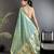 Women light green floral ikkat motifs lichi silk saree