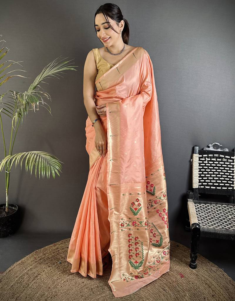 Women peach floral ikkat motifs lichi silk saree