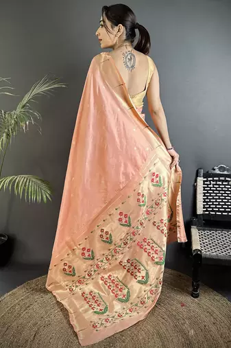 Women peach floral ikkat motifs lichi silk saree
