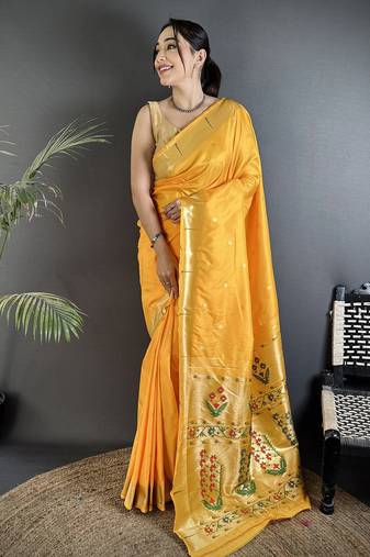 Women yellow floral ikkat motifs lichi silk saree