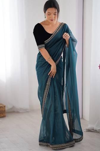 Women net teal zari lace work saree