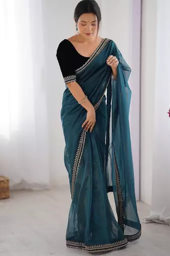 Women net teal zari lace work saree