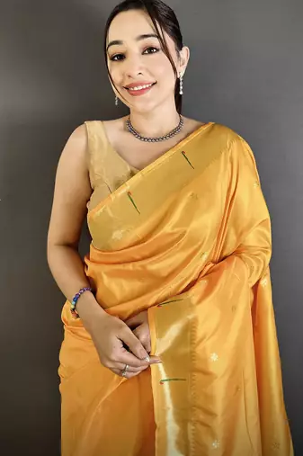Women yellow floral ikkat motifs lichi silk saree