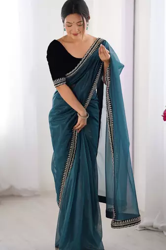 Women net teal zari lace work saree