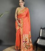 Women orange parrot & floral woven design lichi silk saree