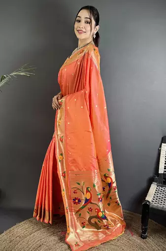 Women orange parrot & floral woven design lichi silk saree