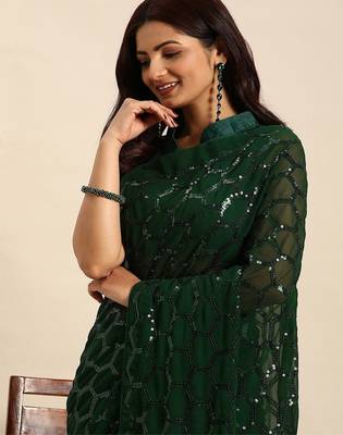 Women gorgette green zari lace work saree 2
