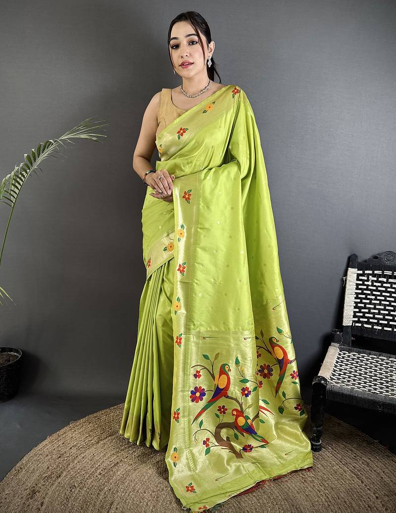 Women lime green parrot & floral woven design lichi silk saree