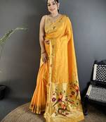Women yellow parrot & floral woven design lichi silk blend saree