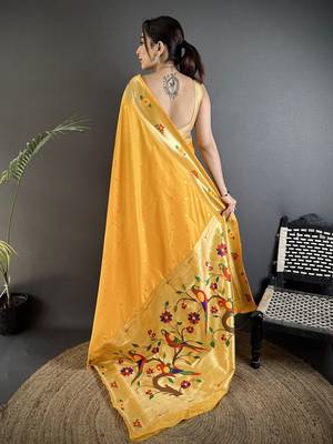 Women yellow parrot & floral woven design lichi silk blend saree 3