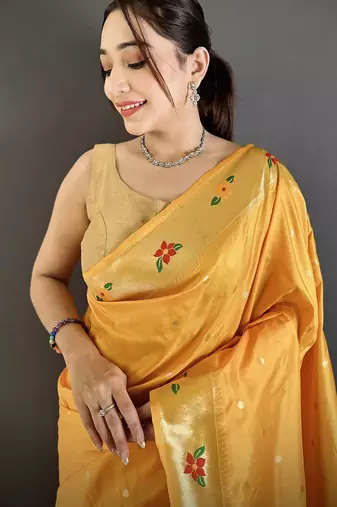 Women yellow parrot & floral woven design lichi silk saree