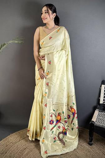 Women cream parrot & floral woven design lichi silk saree