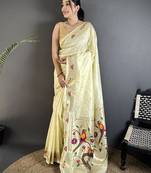 Women cream parrot & floral woven design lichi silk saree