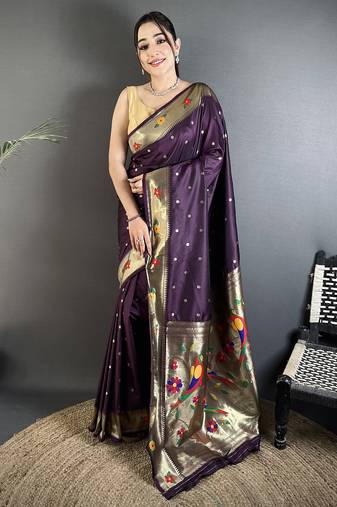 Women wine parrot & floral woven design lichi silk saree
