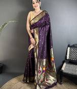 Women wine parrot & floral woven design lichi silk saree