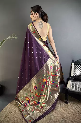 Women wine parrot & floral woven design lichi silk saree