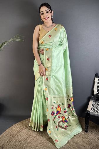 Women mint green parrot & floral woven design lichi silk saree