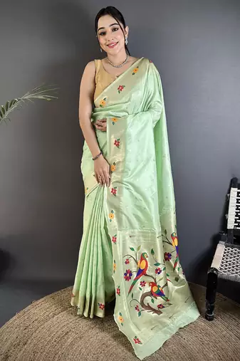Women mint green parrot & floral woven design lichi silk saree
