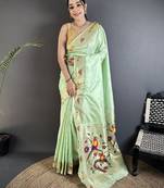 Women mint green parrot & floral woven design lichi silk blend saree