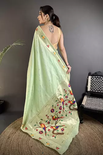 Women mint green parrot & floral woven design lichi silk saree