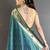 Women teal parrot & floral woven design lichi silk saree