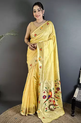 Women light yellow parrot & floral woven design lichi silk saree
