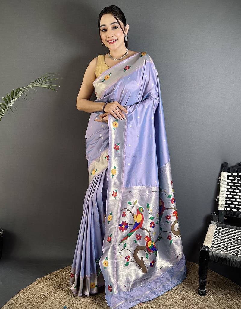 Women lavender parrot & floral woven design lichi silk saree