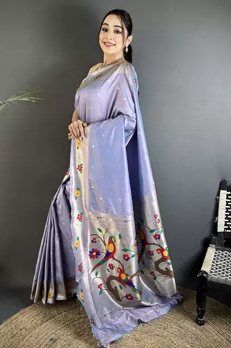 Women lavender parrot & floral woven design lichi silk saree
