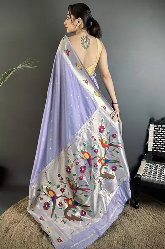 Women lavender parrot & floral woven design lichi silk saree