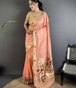 Women peach parrot & floral woven design lichi silk saree