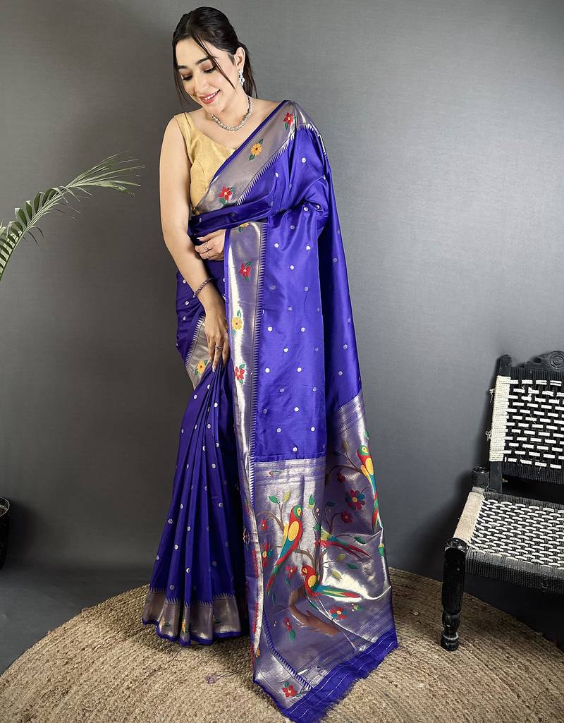 Women royal blue parrot & floral woven design lichi silk saree