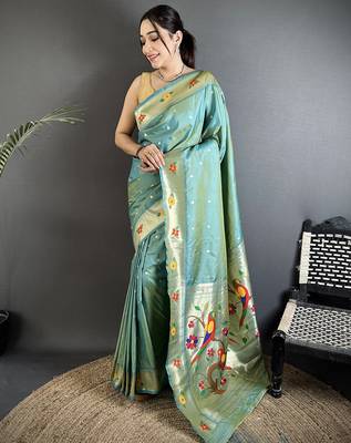 Women aqua blue parrot & floral woven design lichi silk blend saree 1