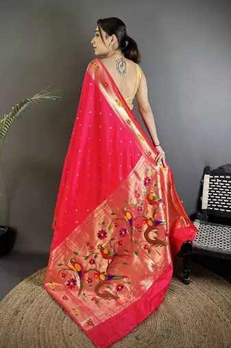 Women rani pink parrot & floral woven design lichi silk saree