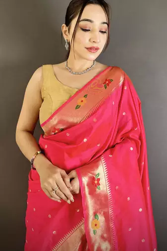 Women rani pink parrot & floral woven design lichi silk saree