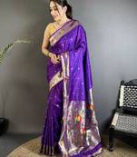 Women purple parrot & floral woven design lichi silk saree