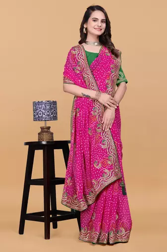 Women gorgette pink zari lace work saree